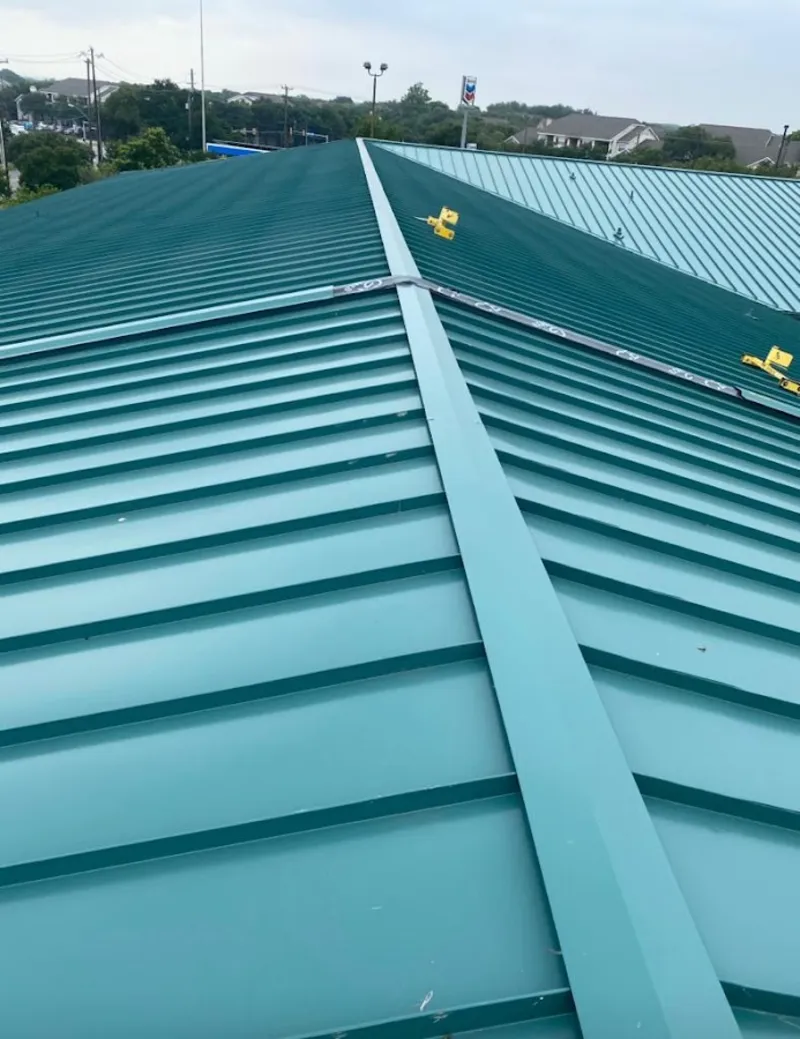 Green commercial metal roof ridge and valley for Metal Roof Repair in Shoreview