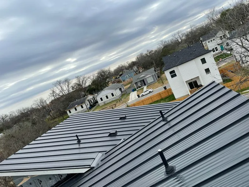Standing seam metal roof panels with vents for Skylight Repair in Shoreview